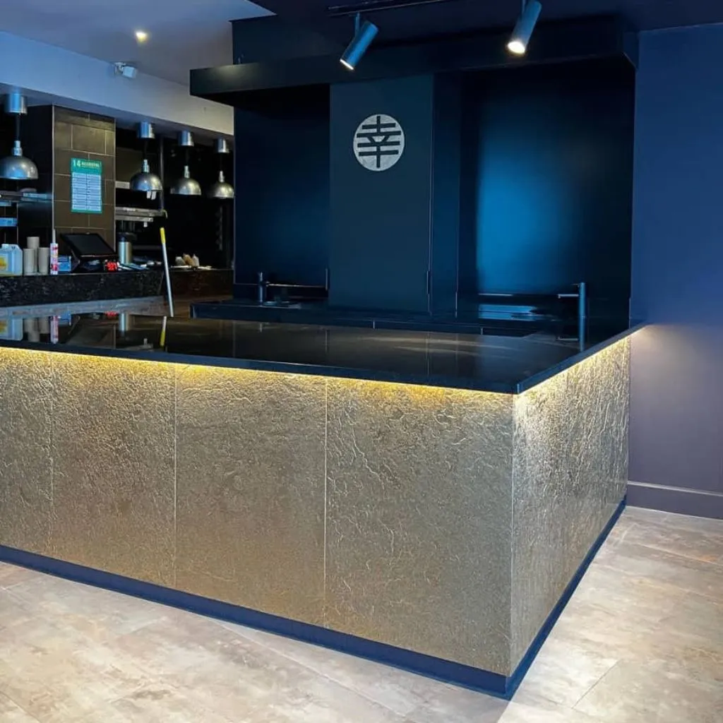 Metallic Gold art decor veneer restaurant counter
